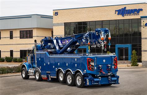 The 3 stage boom has 264” of extension and a reach of 270” off the tailboard. . Rotator wrecker cost per hour